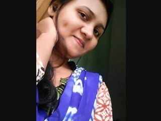 Bengali girl with a cute smile masturbates with her fingers