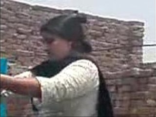 Desi aunty and friend indulge in outdoor sex in terrace