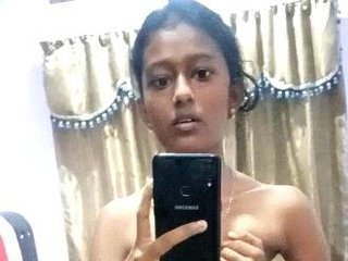 Nude Indian teenager takes solo MMS of herself masturbating