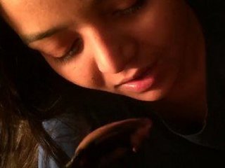 Chocolate-skinned girl gives daddy a blowjob
