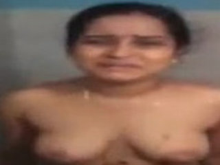 Telugu bhabhi's nude bath and clothing session