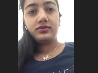Cute desi wife shows off her nice boobs in video