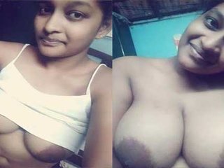 Tamil babe flaunts her huge breasts in nude video