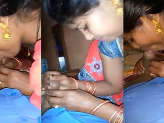 Indian village bhabhi's blowjob skills on camera