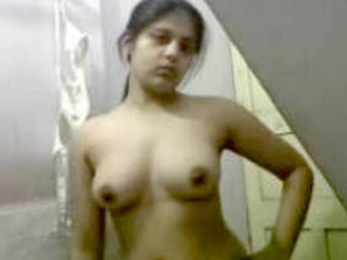 Indian babe flaunts her boobs and pussy in the bathroom