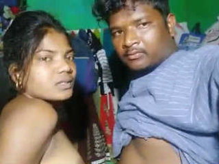 Indian couple gets intimate in front of their village