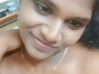 Tamil babe flaunts her breasts in a sensual video
