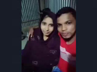 A village girl from India films herself in a VDO