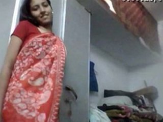 Sari-clad teen strips for money in striptease video