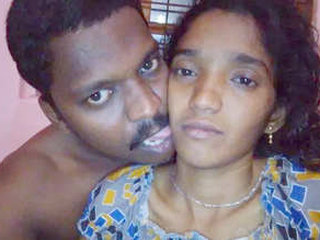 A cute Asian girl and her girlfriend's father engage in anal sex in a Desi video