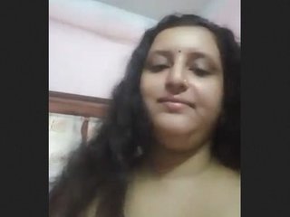 Busty Indian Bhabhi flaunts her assets on camera