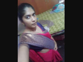 Indian girl flaunts her large breasts