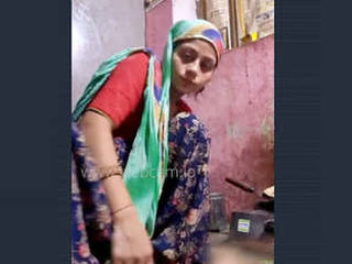 Rural wife bares her buttocks in front of camera