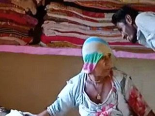 A rural guy has sex with a mature bhabhi in a village setting