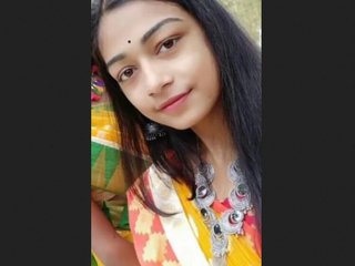 Assamese girl enjoys fingering and pussy play in video