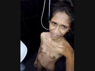 Lankan girl with small boobs takes a bath in the nude